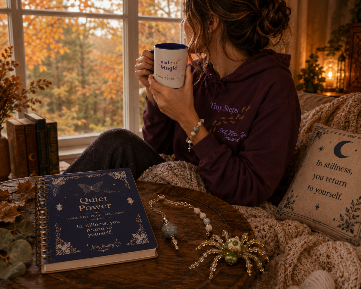 Cozy autumn self-care scene with candlelight, journal writing, meaningful jewelry, warm tea, and seasonal décor creating a peaceful atmosphere for reflection and intentional living.