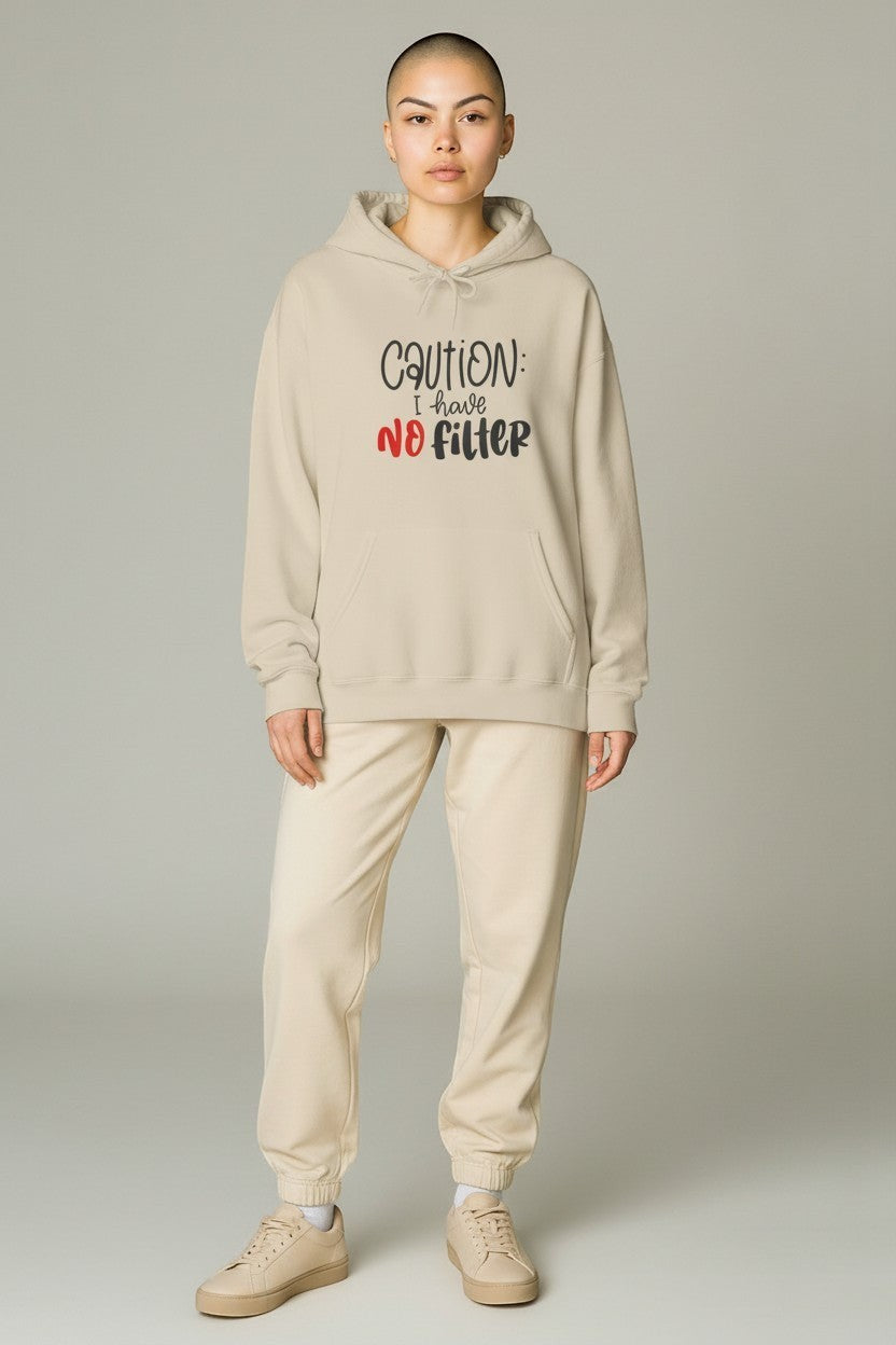 Woman wearing beige hoodie and matching set, a cozy and stylish loungewear outfit with graphic design.