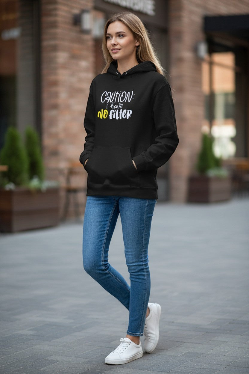 Woman wearing black “Caution I Have No Filter” hoodie, a bold and funny graphic sweatshirt for casual street style.