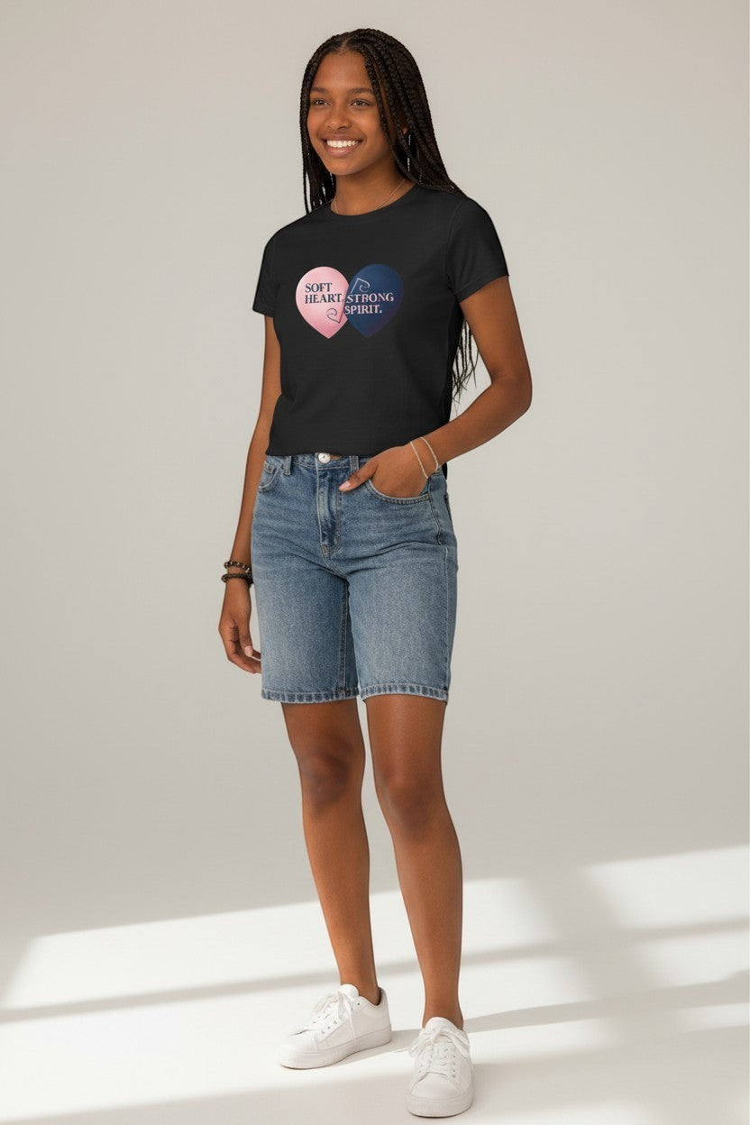 Woman wearing black “Soft Heart Strong Spirit” t-shirt, a sleek and modern look.