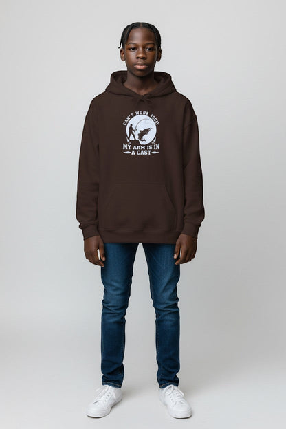 Person wearing brown hoodie with nature-inspired graphic, perfect for earthy casual outfits.