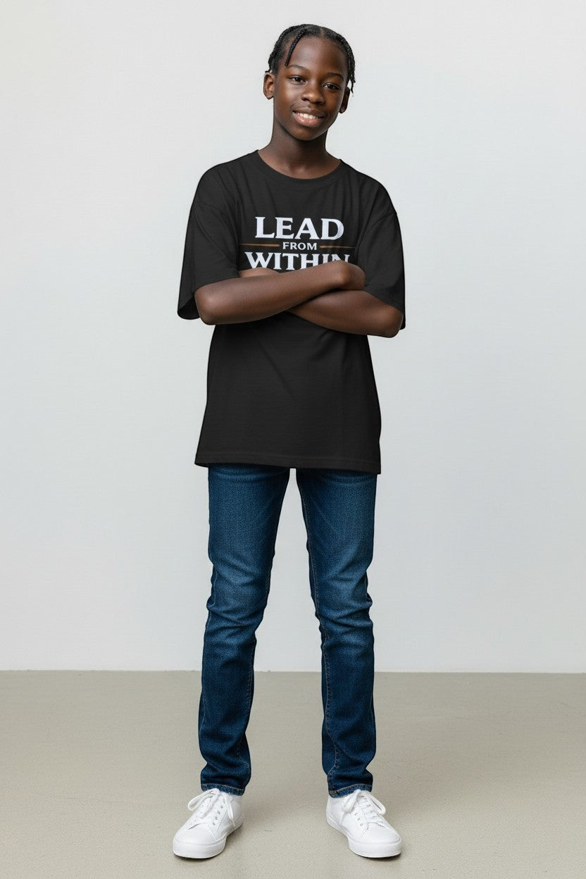 Young person wearing charcoal “Lead From Within” t-shirt, a bold and empowering casual style.