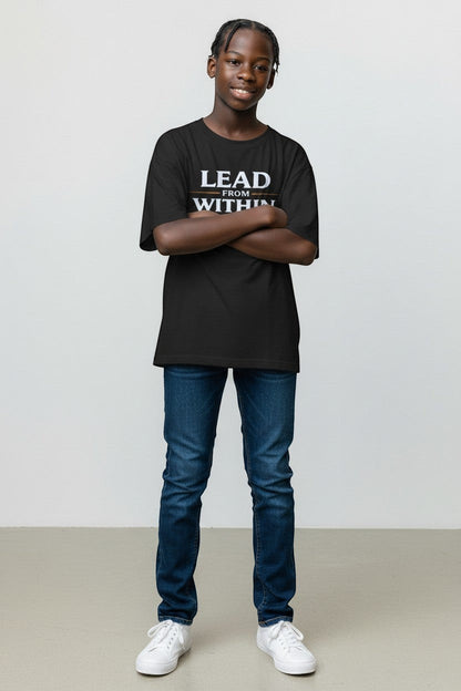 Young person wearing charcoal “Lead From Within” t-shirt, a bold and empowering casual style.