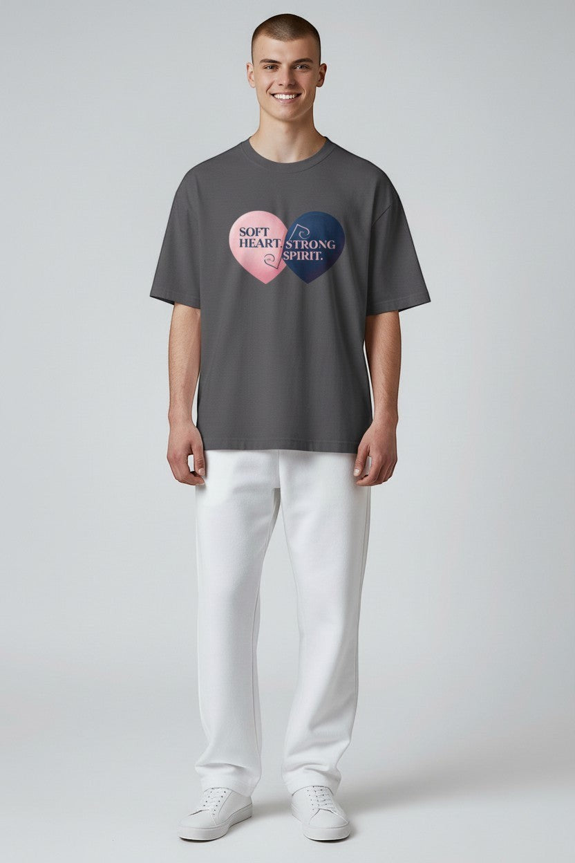 Man wearing charcoal “Soft Heart Strong Spirit” t-shirt, a modern and minimal everyday style.