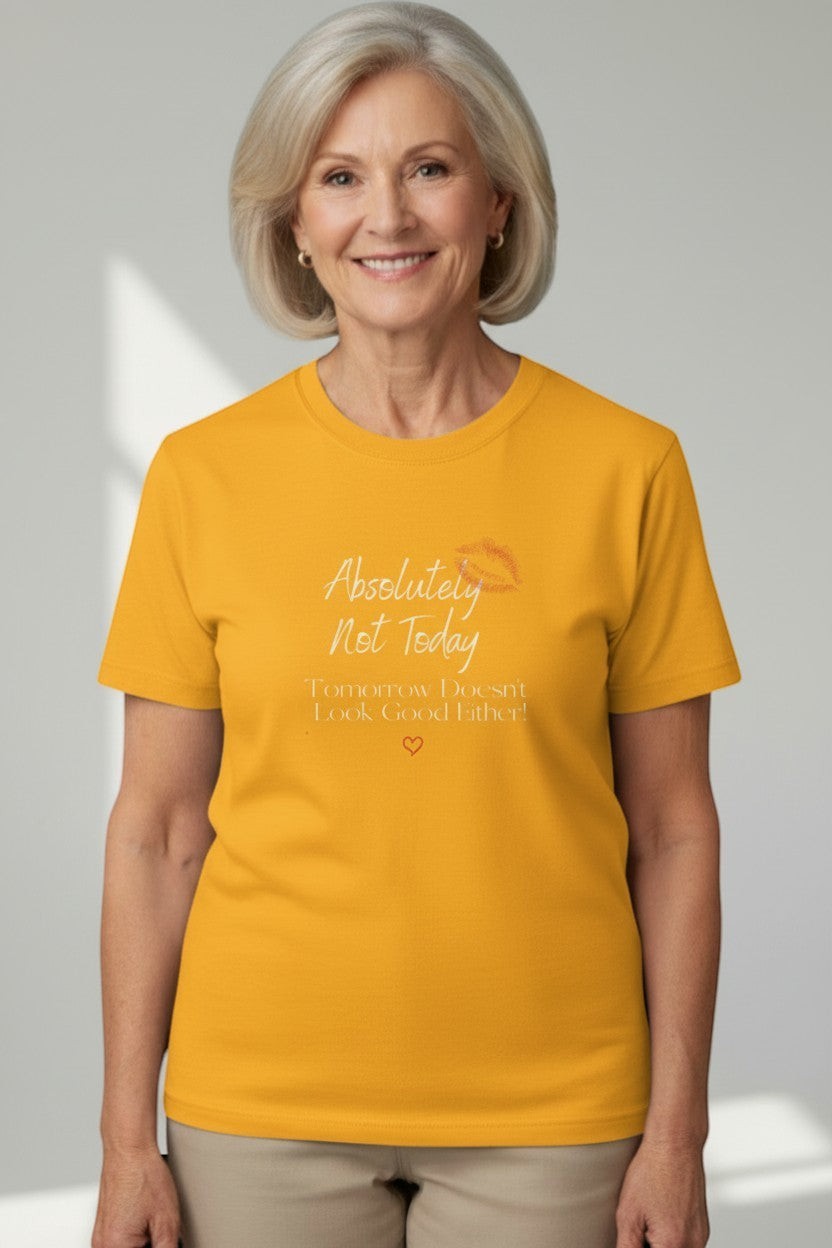 Woman wearing gold “Absolutely Not Today” t-shirt, a warm and cheerful casual look.