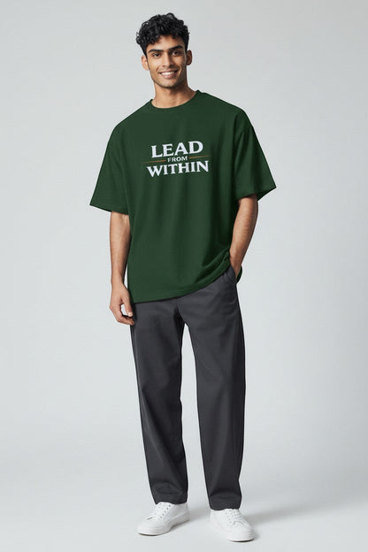Man wearing forest green “Lead From Within” t-shirt, a grounded and confident everyday style.