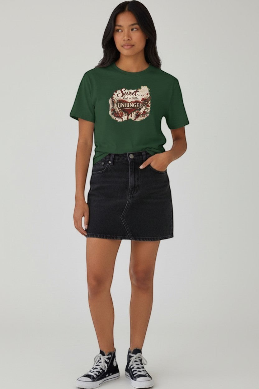 Woman wearing green “Sweet but a Little Unhinged” shirt, a fun and comfortable casual tee.