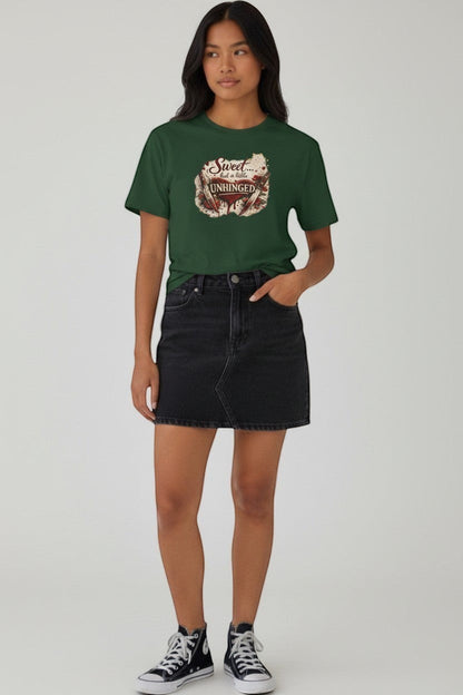 Woman wearing green “Sweet but a Little Unhinged” shirt, a fun and comfortable casual tee.