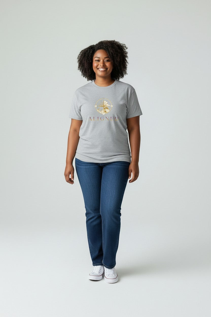 Woman wearing sport grey “Aligned” t-shirt, a neutral and versatile everyday look.