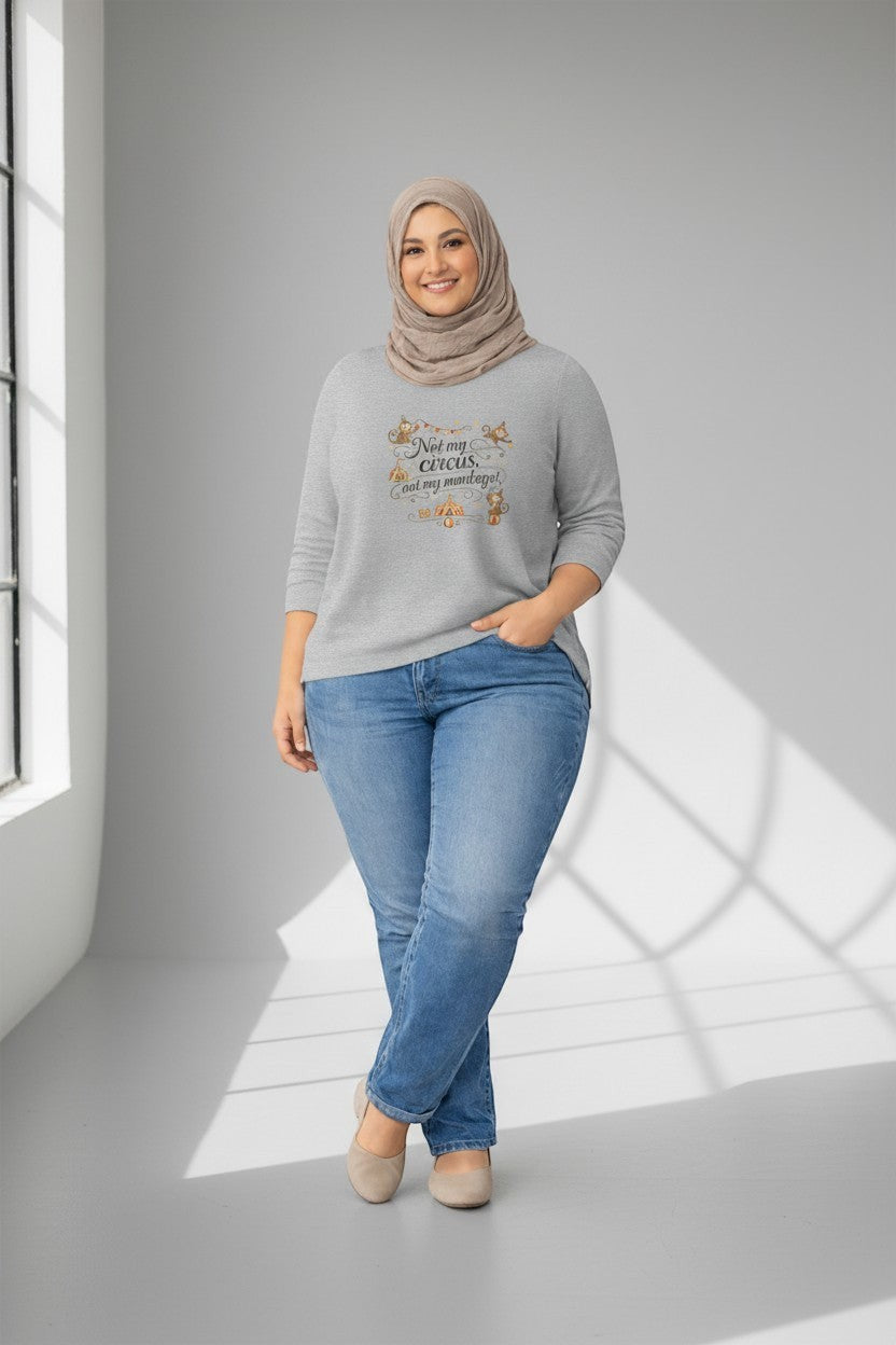 Woman wearing grey “Not My Circus Not My Monkeys” t-shirt, a relaxed and relatable graphic tee.