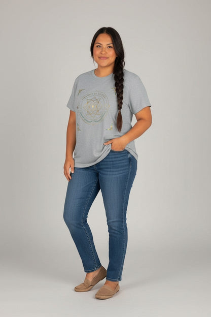 Woman wearing grey sacred geometry t-shirt, a simple and meaningful everyday style.