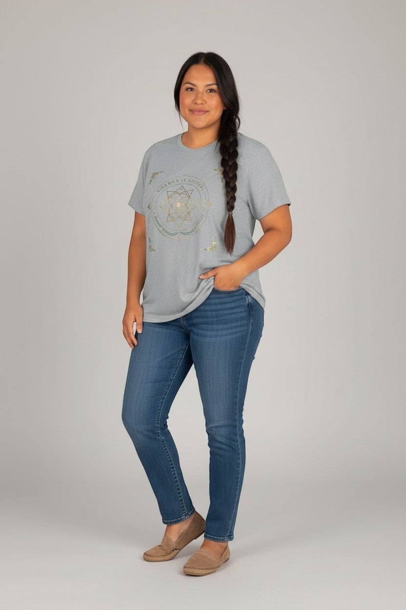 Woman wearing grey sacred geometry t-shirt, a simple and meaningful everyday style.