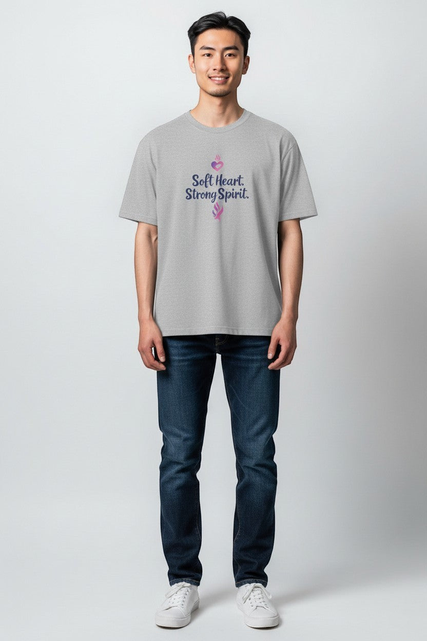 Man wearing grey “Soft Heart Strong Spirit” t-shirt, a comfortable and meaningful casual tee.