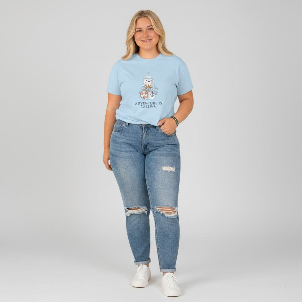 Jena Jewelry light blue 100% cotton t-shirt with a cute sailor bear graphic and the text "Adventure Is Calling".