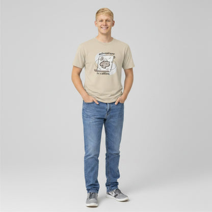 Jena Jewelry beige 100% cotton t-shirt with a vintage treasure map graphic and the text "adventure is calling".