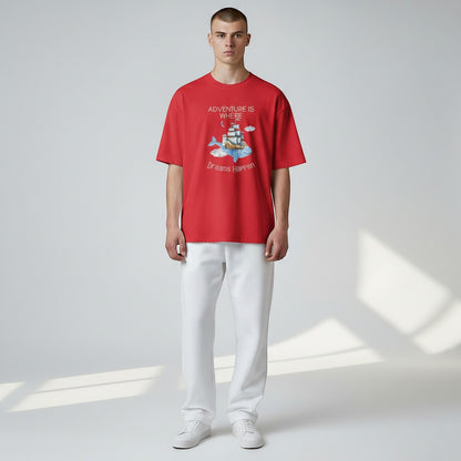 Jena Jewelry red cotton graphic t-shirt with "Adventure Is Where Dreams Happen" quote and watercolor whale, ship, lighthouse, clouds design.
