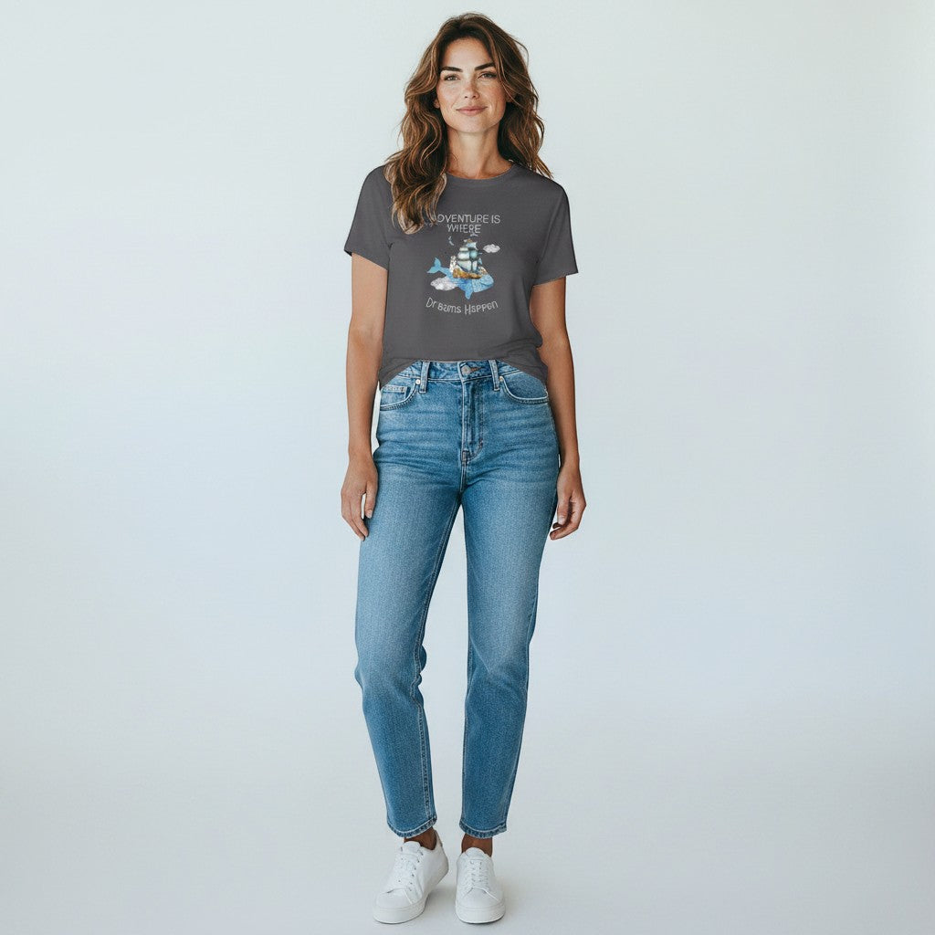 Jena Jewelry charcoal cotton graphic tee with whale, ship, lighthouse, clouds, and quote "Adventure Is Where Dreams Happen".