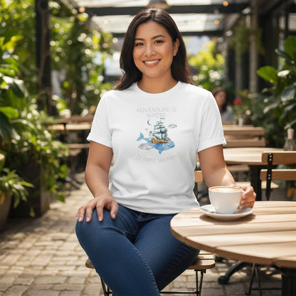 Jena Jewelry white cotton t-shirt with watercolor whale, ship, lighthouse, and clouds graphic. Quote: "Adventure Is Where Dreams Happen".
