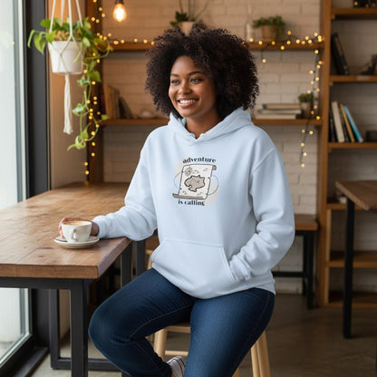 Jena Jewelry light blue cotton-poly blend hoodie with a minimalist map graphic and the text "adventure is calling".
