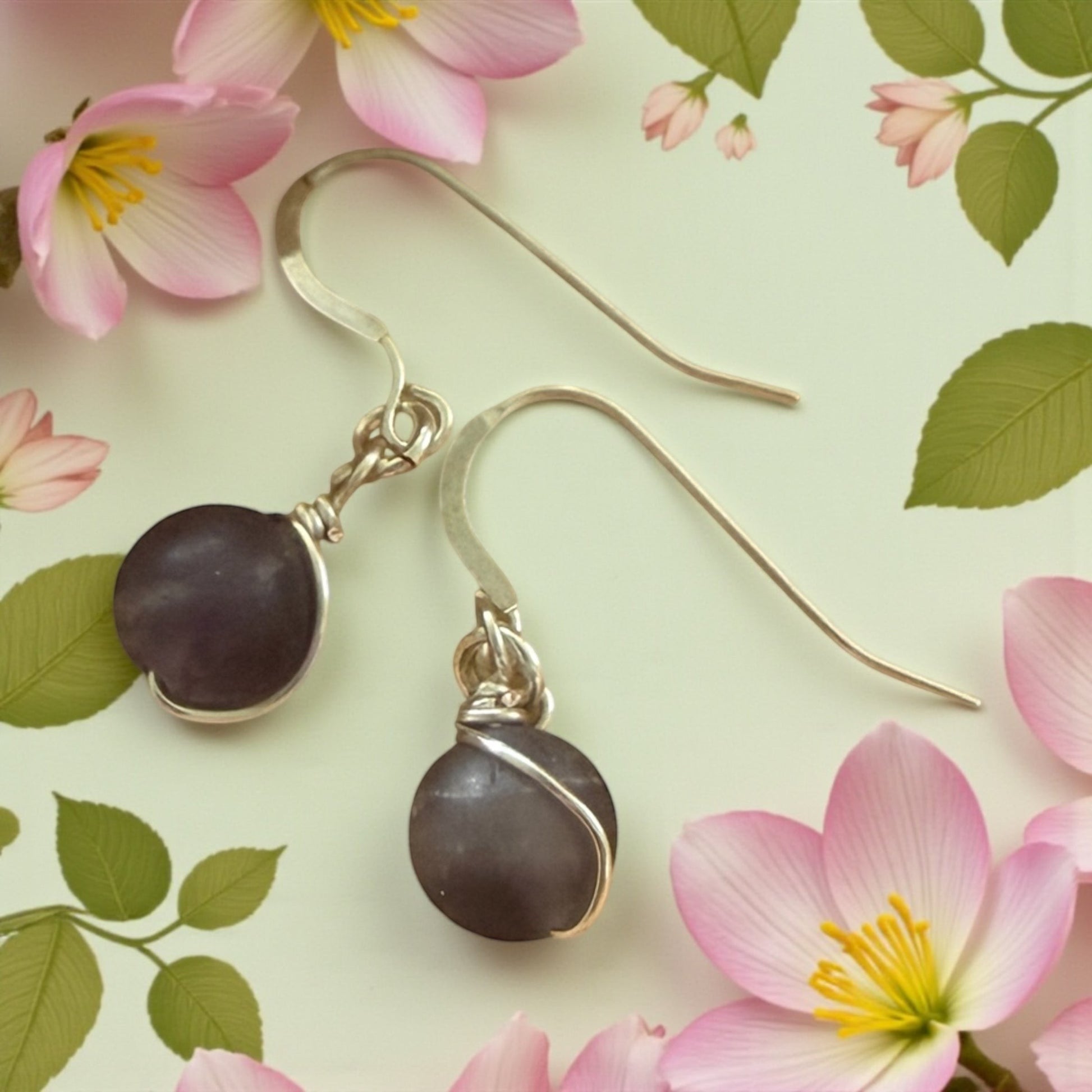 Jena Jewelry amethyst wire-wrapped earrings with silver hooks, handcrafted for spiritual clarity.
