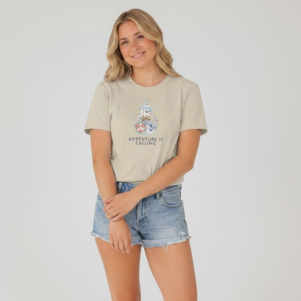 Jena Jewelry beige 100% cotton t-shirt with a cute sailor bear on a ship graphic and the text Adventure Is Calling.