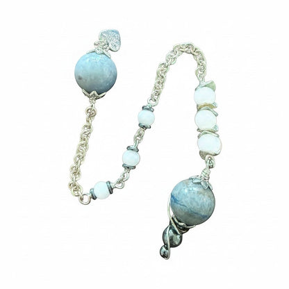 Jena Jewelry pendulum with blue aventurine, snow jade, and hematite beads on a chainmaille handle.