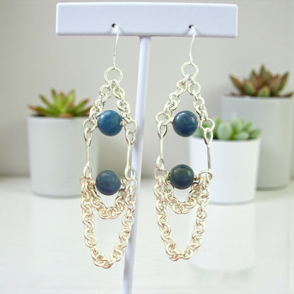 Jena Jewelry silver-filled chain link dangle earrings with two blue gemstones each. Hypoallergenic.
