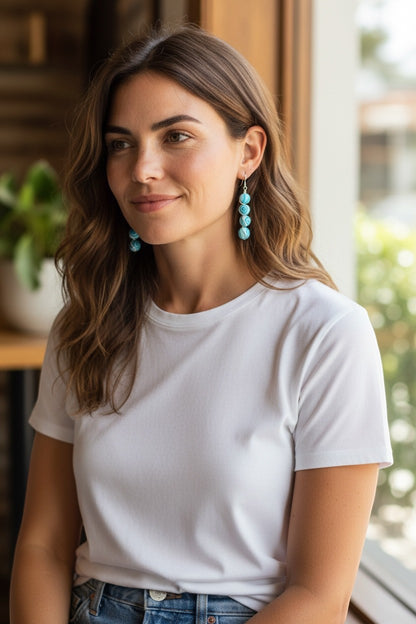 Jena Jewelry stacked blue glass drop earrings with silver-tone wire wrapping and hypoallergenic ear wires.