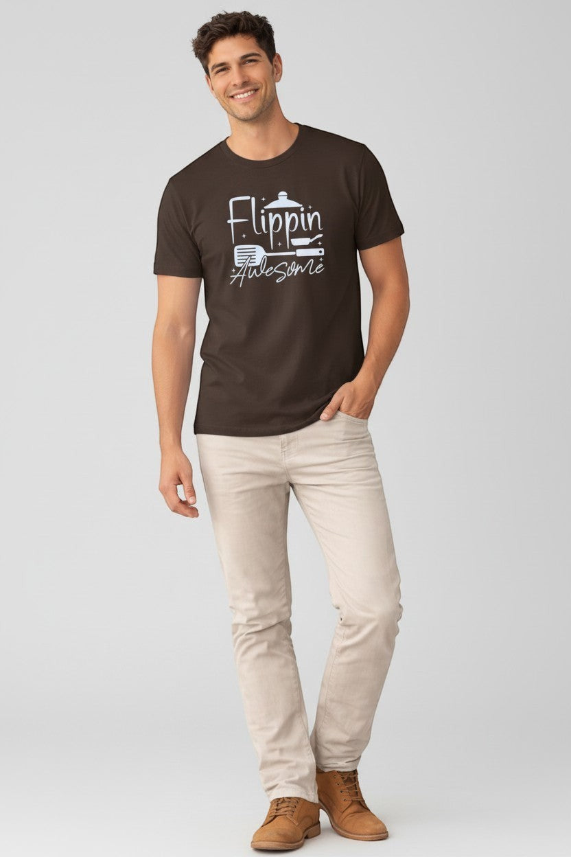 Jena Jewelry men's dark brown 100% cotton t-shirt with a white graphic print of a spatula and pan with the text "Flippin Awesome".