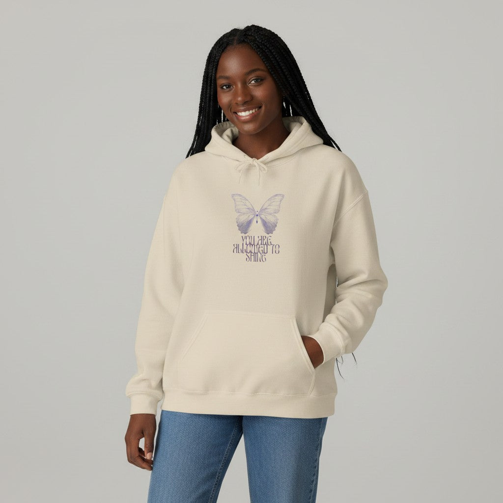 Jena Jewelry cream cotton-polyester blend hoodie with a faded lavender butterfly graphic and text "And Then She Almost Forgot" on the chest.