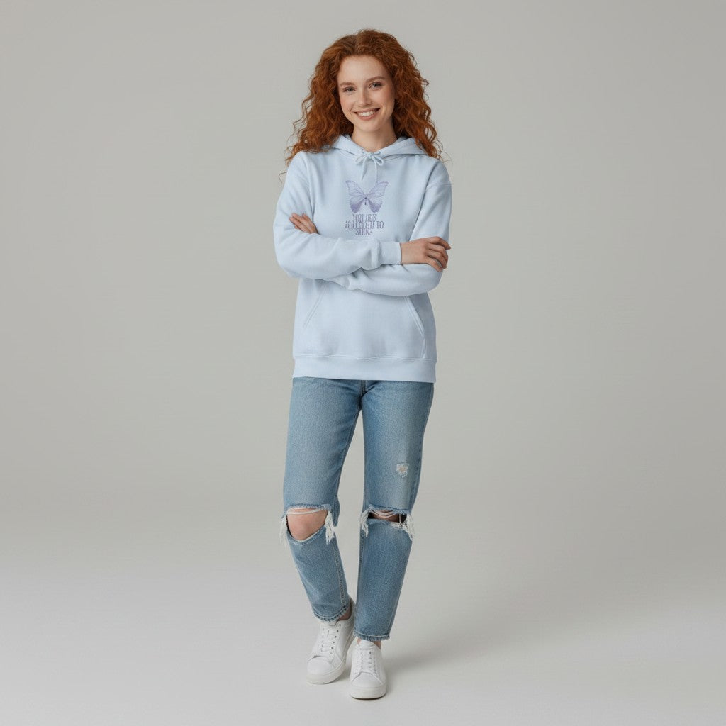 Jena Jewelry light blue cotton-polyester blend hoodie with a faded lavender butterfly graphic and text "And Then She Almost Forgot" on the chest.