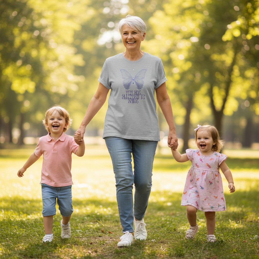Jena Jewelry grey 100% cotton t-shirt with a purple butterfly graphic and inspirational text "You Are Allowed to Shine."