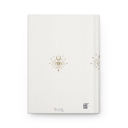 Jena Jewelry hardcover journal with celestial eye and moon design in gold on a cream background. Ideal for affirmations, manifestation, and gratitude.