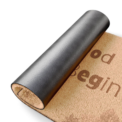 Jena Jewelry natural coir doormat with "Good Moments Begin" text and anti-slip backing.