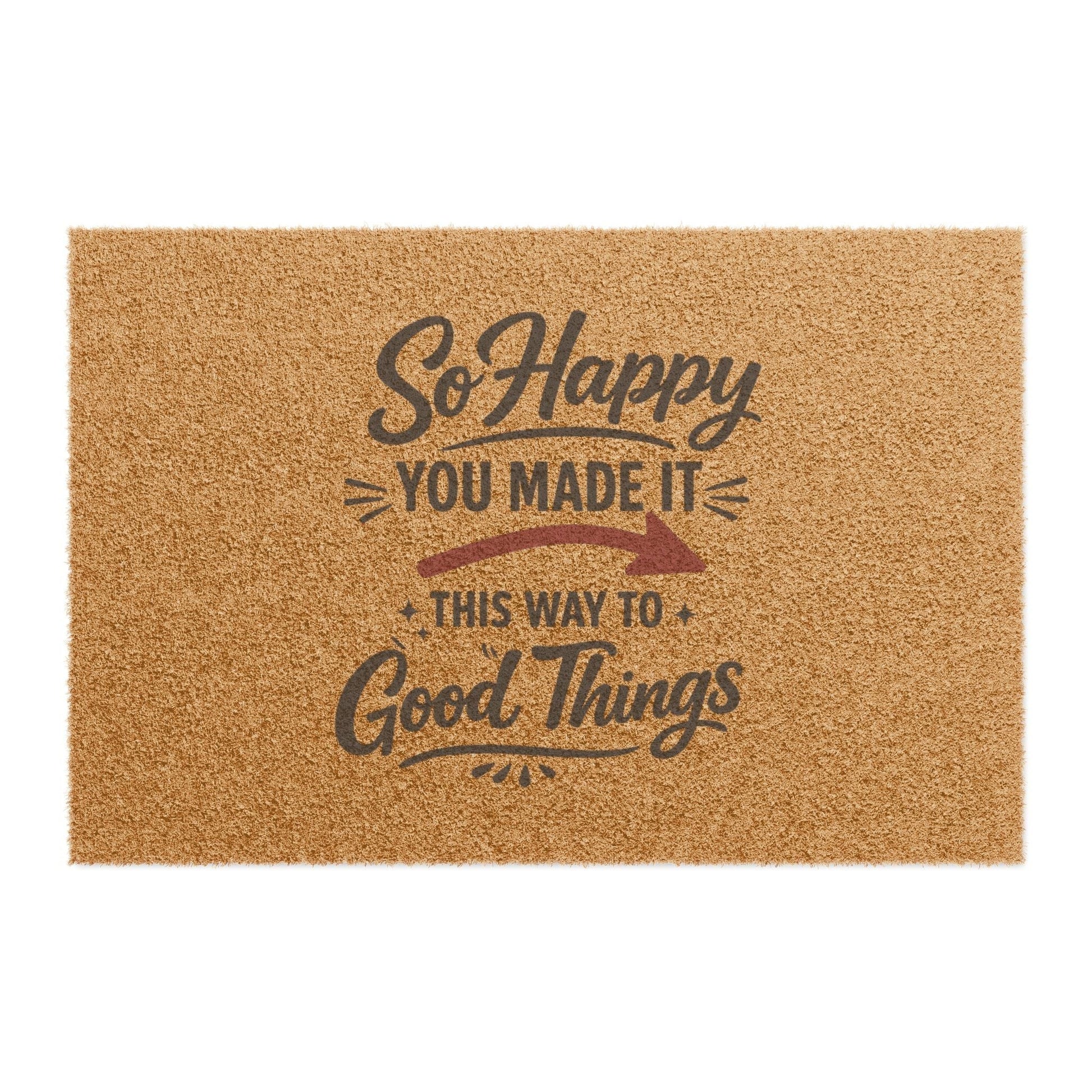 Jena Jewelry natural coir doormat with "So Happy You Made It This Way To Good Things" text in dark grey.
