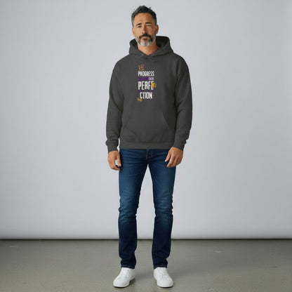 Jena Jewelry dark grey cotton-polyester blend hoodie with "Progress Over Perfection" graphic. Features a kangaroo pocket and double-lined hood.