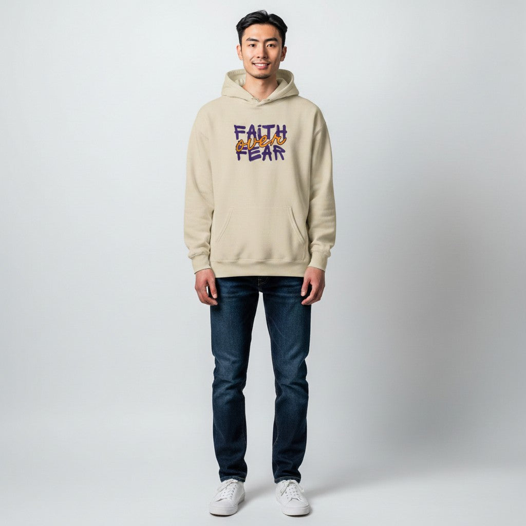 Jena Jewelry cream 50/50 cotton-poly blend hoodie with "Faith Over Fear" graphic print. Features a drawstring hood, kangaroo pocket, and cuffed sleeves.