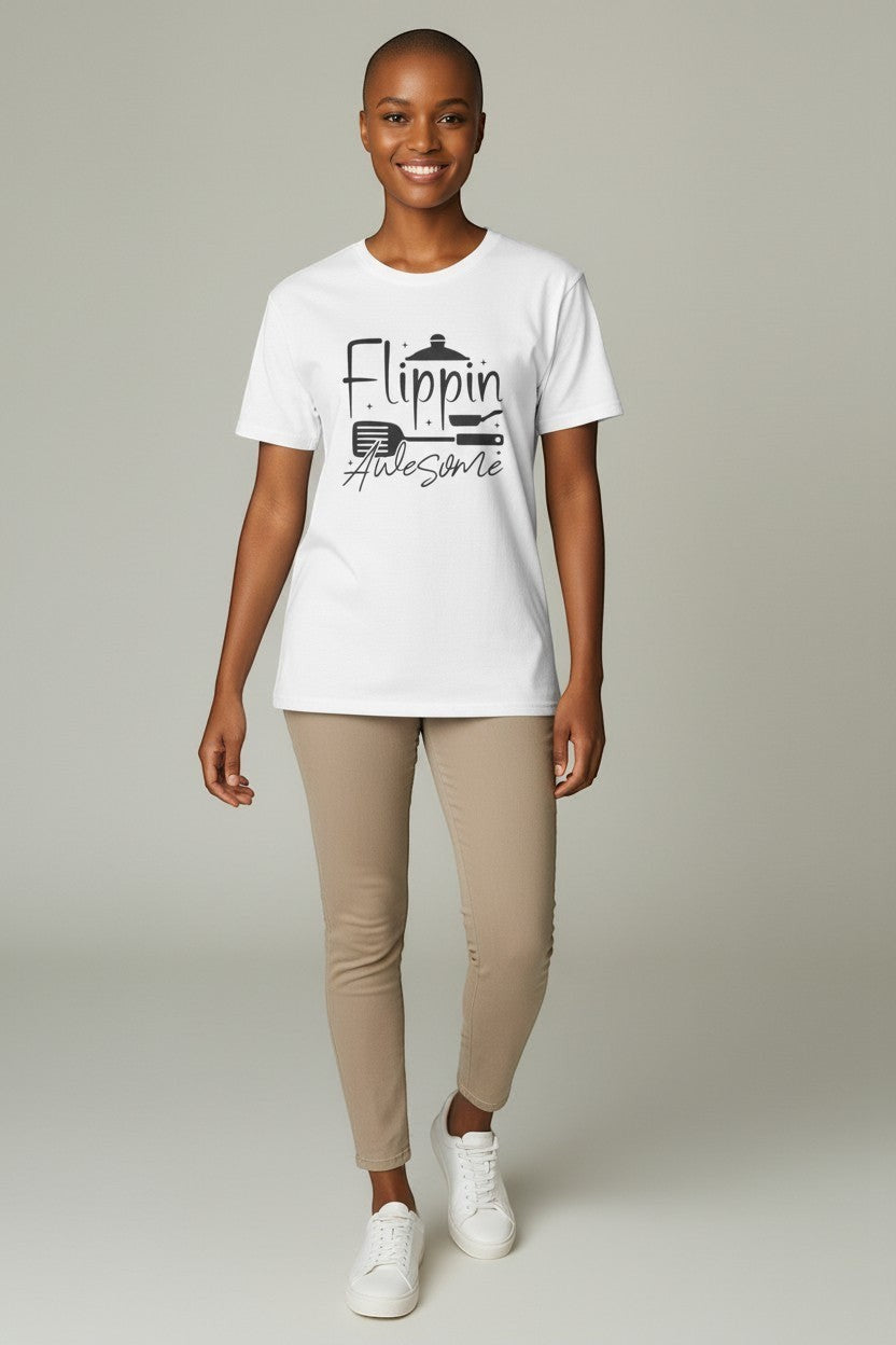 Jena Jewelry white 100% cotton t-shirt with a graphic print of a pot, spatula, and frying pan with the text "Flippin' Awesome".