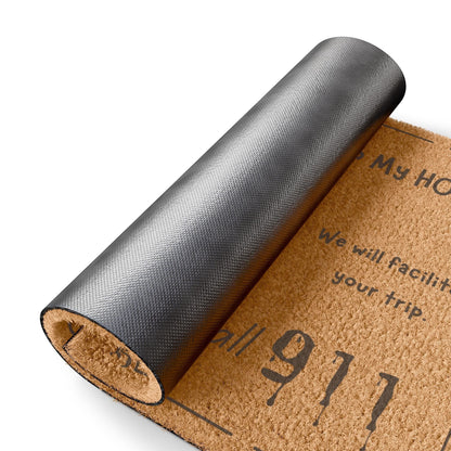 Jena Jewelry funny doormat made of natural coir fiber with black anti-slip backing and text "My Home, We will facilitate your trip. Call 911"
