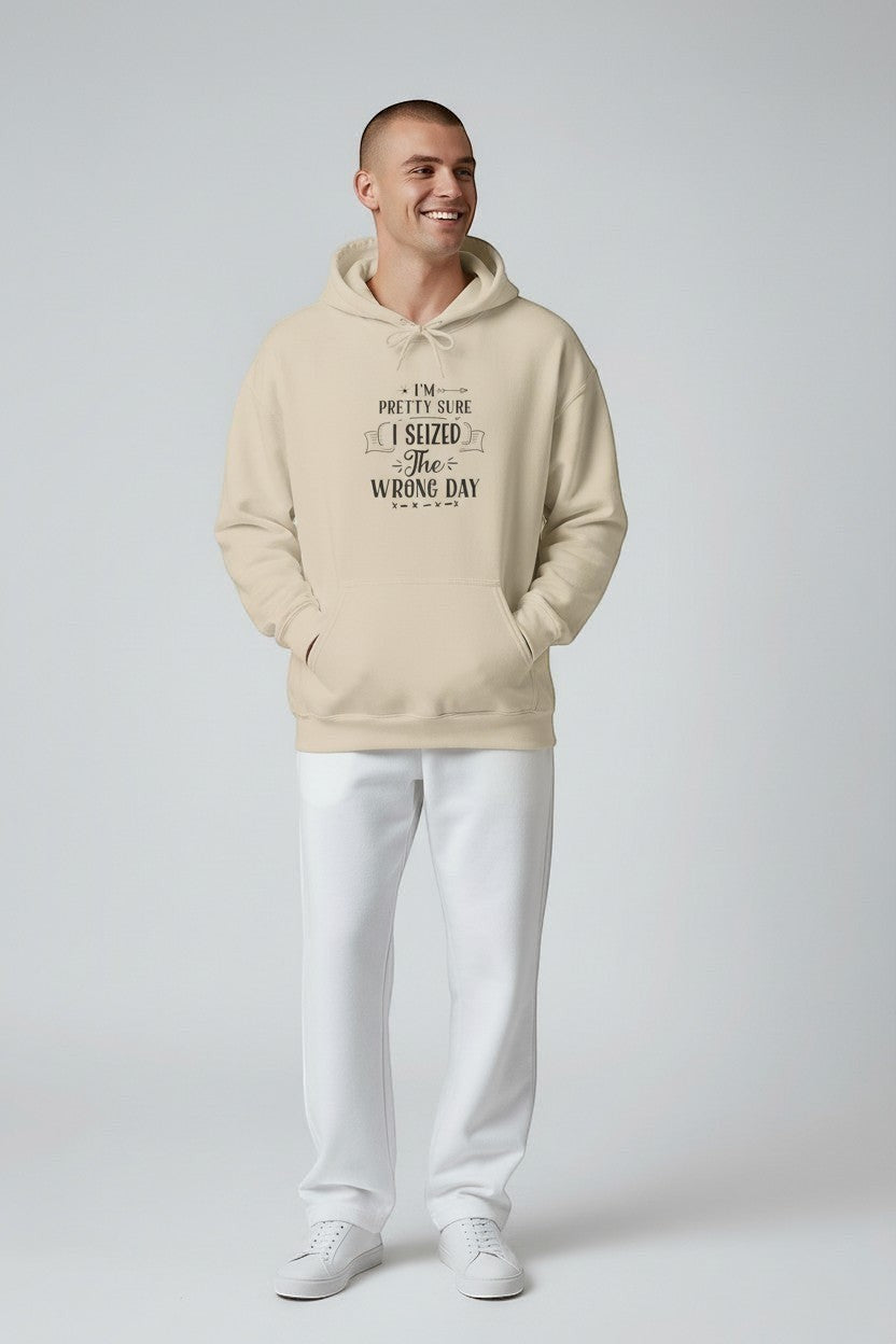 Jena Jewelry beige cotton-poly blend hoodie with "I'm Pretty Sure I Seized the Wrong Day" graphic print on chest. Model wears size L.