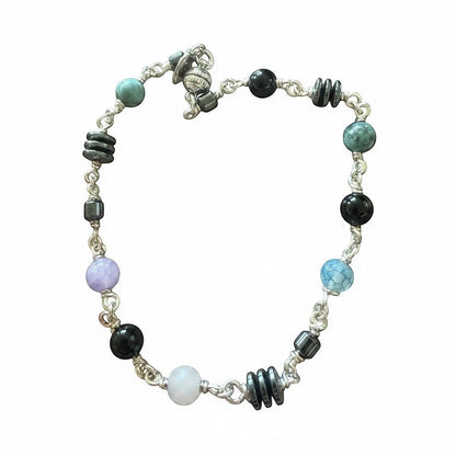 Jena Jewelry anklet with Hematite, Rose Quartz, Indigo, Black Onyx, and Jasper beads. Silver chain.
