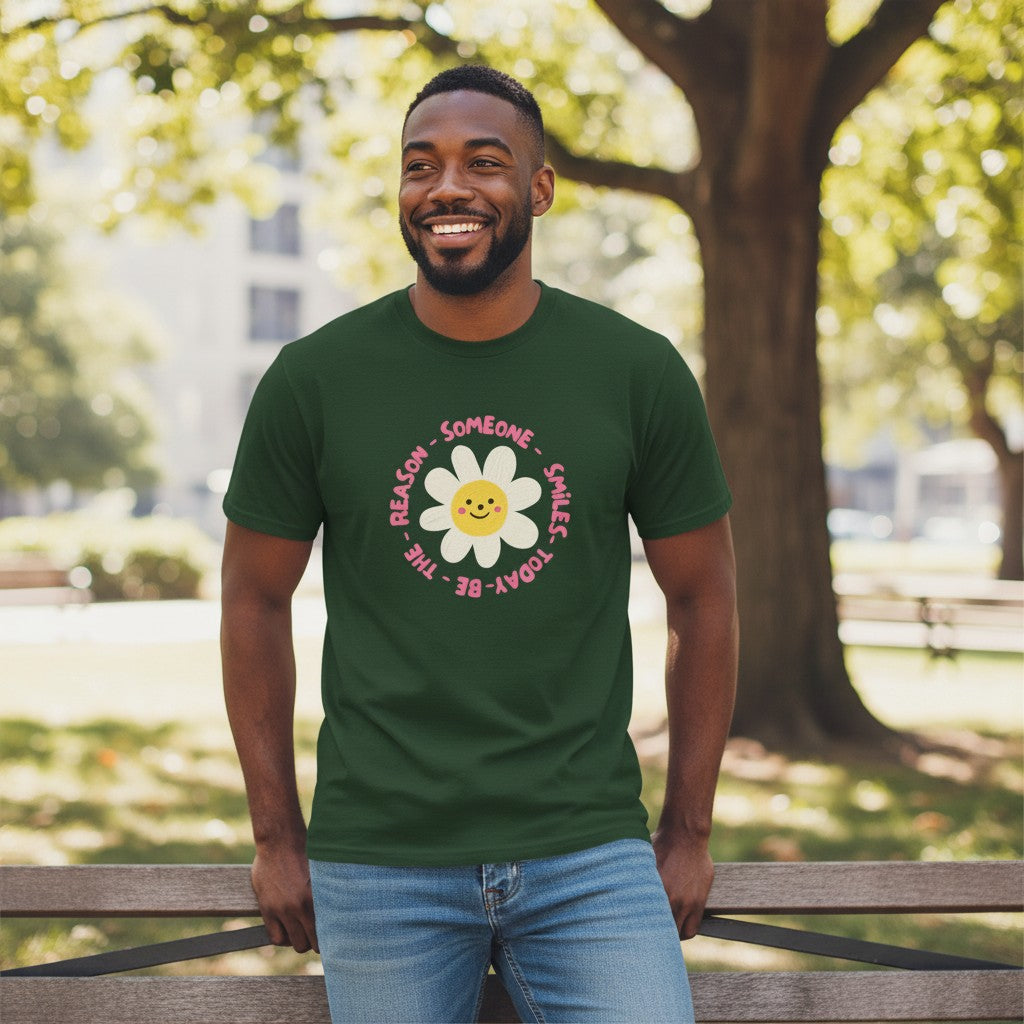 Jena Jewelry dark green 100% cotton t-shirt with a smiling daisy graphic and "Be the Reason Someone Smiles Today" text.