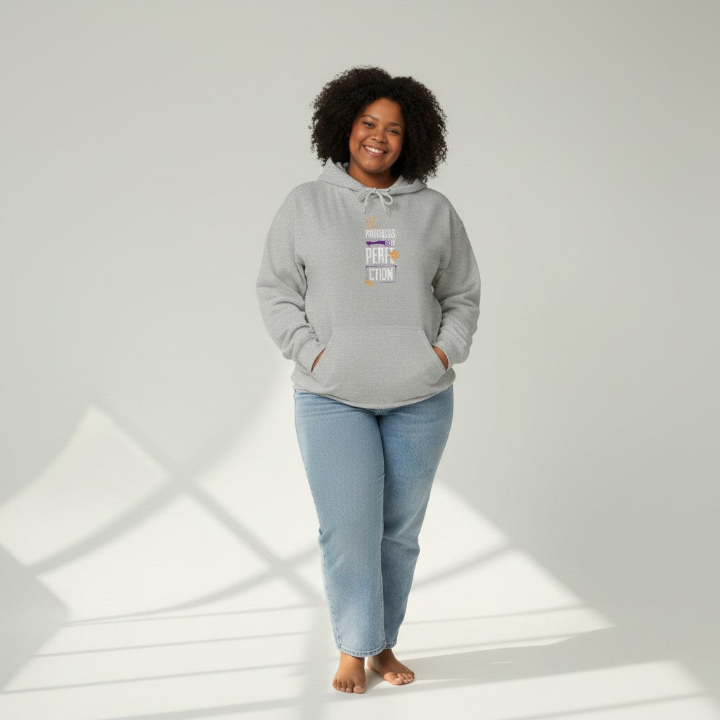 Jena Jewelry light grey cotton-blend hoodie with "Progress Over Perfection" graphic print. Features a kangaroo pocket and drawstring hood.