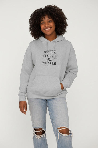 Jena Jewelry light grey heathered cotton-poly blend pullover hoodie with "I'm Pretty Sure I Seized The Wrong Day" graphic text on chest.