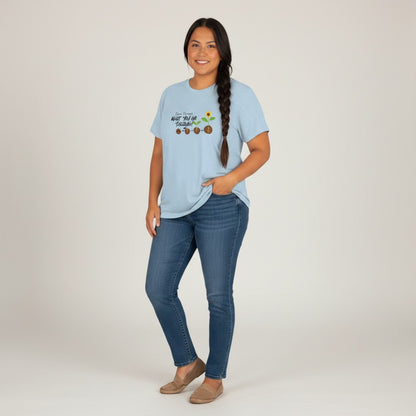 Jena Jewelry light blue 100% cotton t-shirt with "Grow Through What You Go Through" graphic showing plant growth stages.