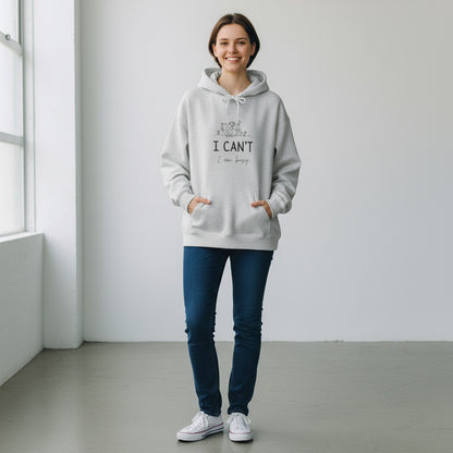 Jena Jewelry light grey heathered cotton-poly blend hoodie with "I CAN'T, I am Busy" text and line art graphic.