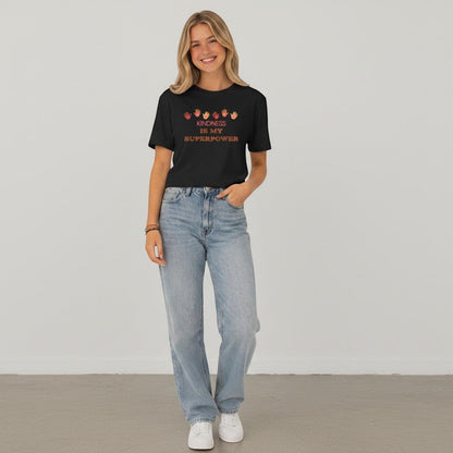 Jena Jewelry black cotton t-shirt with "KINDNESS IS MY SUPERPOWER" graphic and handprints.