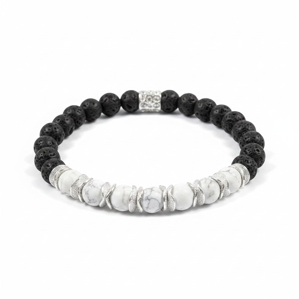 Jena Jewelry black lava stone and white howlite beaded stretch bracelet with silver accents.