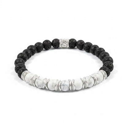 Jena Jewelry black lava stone and white howlite beaded stretch bracelet with silver accents.