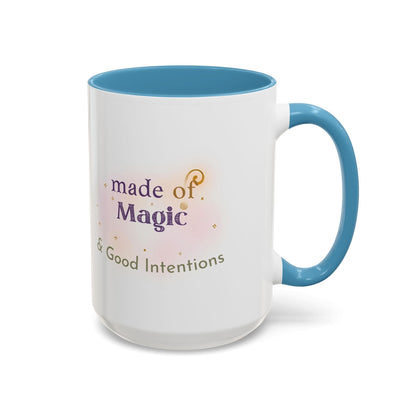 Jena Jewelry white ceramic mug with blue handle and interior, featuring "made of Magic & Good Intentions" text and watercolor design.